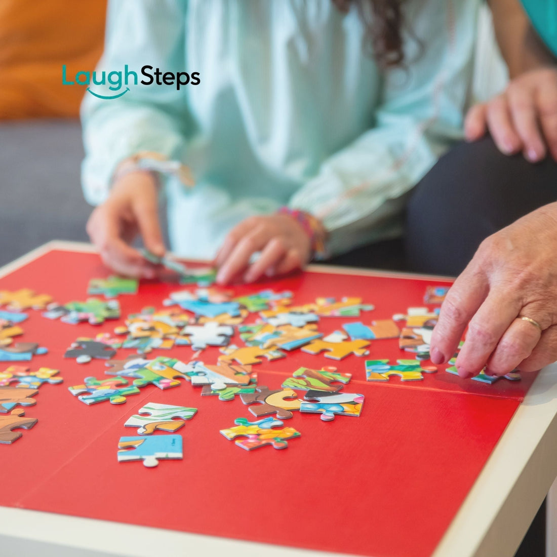 Child building an educational wooden puzzle for early childhood development