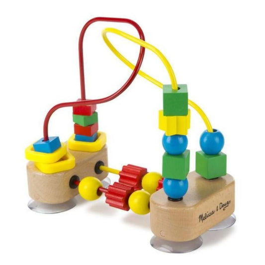 Little hands can slide, spin and explore with a compact first bead maze made for high-chair or tabletop play. The suction base helps keep the toy secure while colourful beads travel along four soft-coated wires.